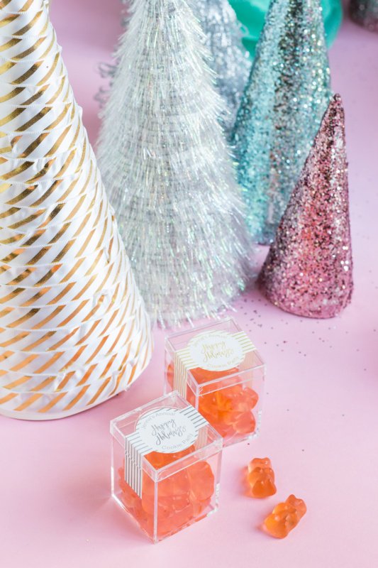 Sparkly cone Christmas trees with champagne gummy bears for a pink Christmas or kitsch Christmas. 